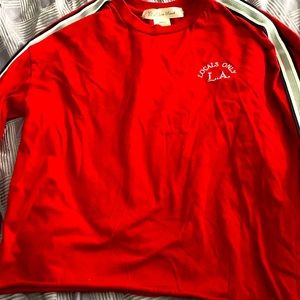 This is a cropped shirt.